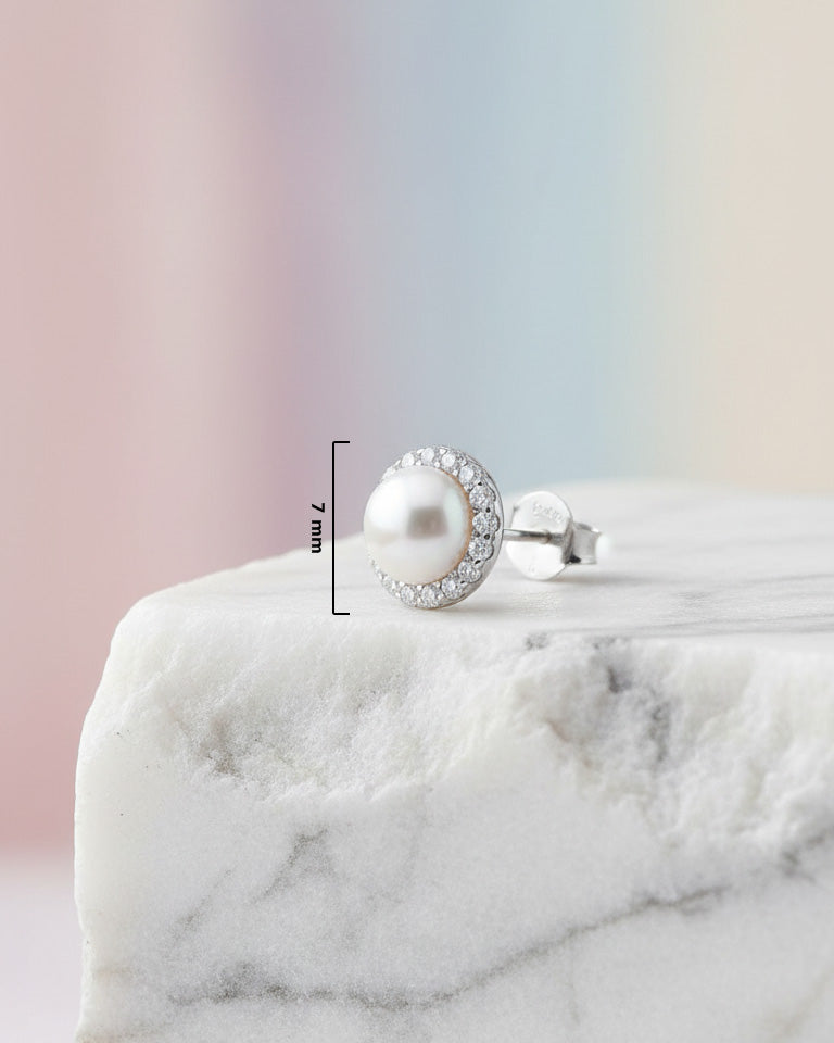pearl stud earring with halo setting.