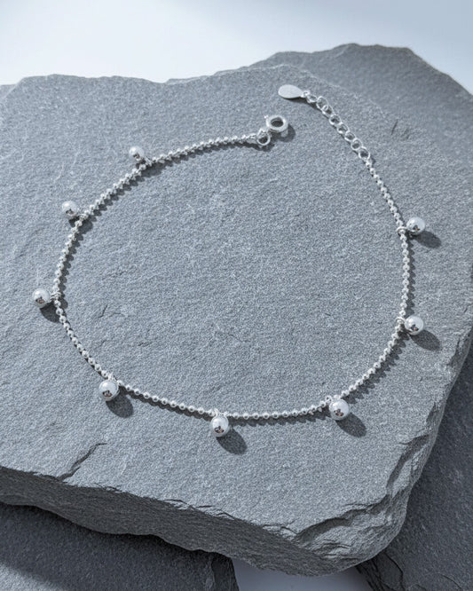 beads chain anklets with dangling bigger beads.