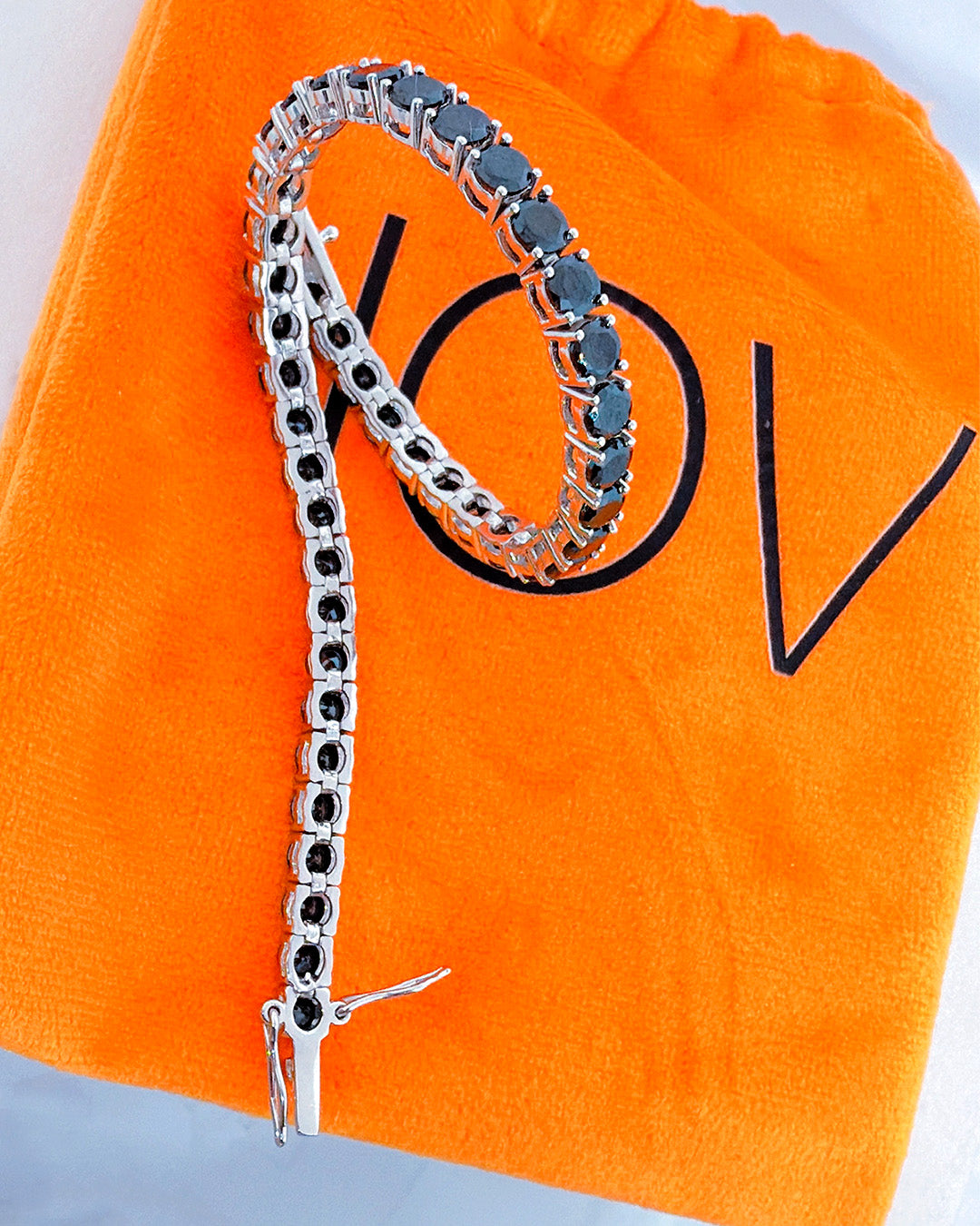 Black CZ tennis bracelet.