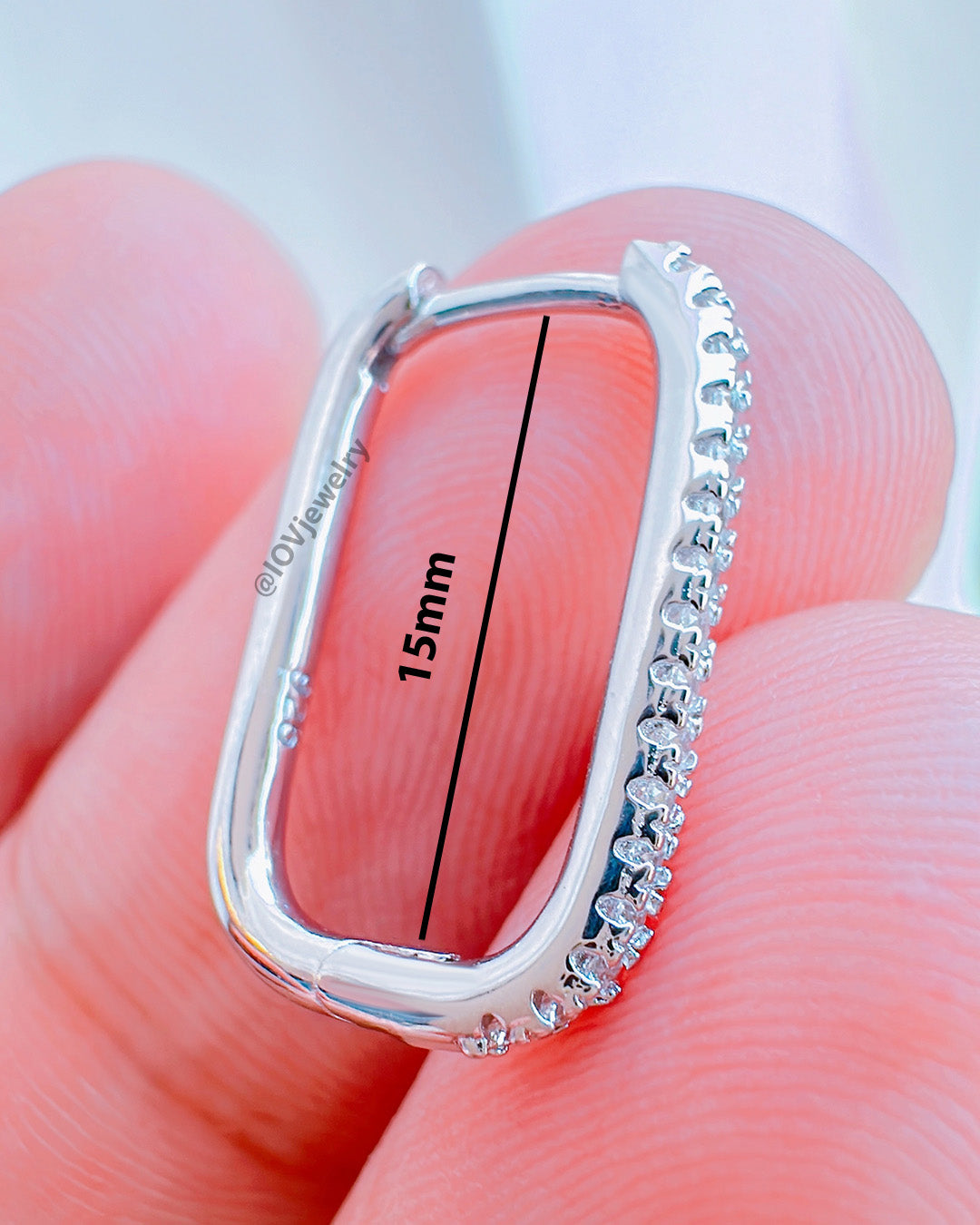 rectangular single line CZ hoop earring.