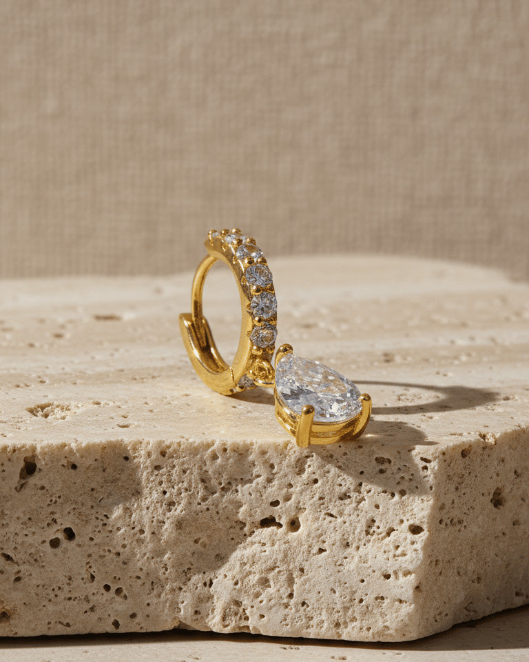 CZ tear drop shape huggie hoop earring.