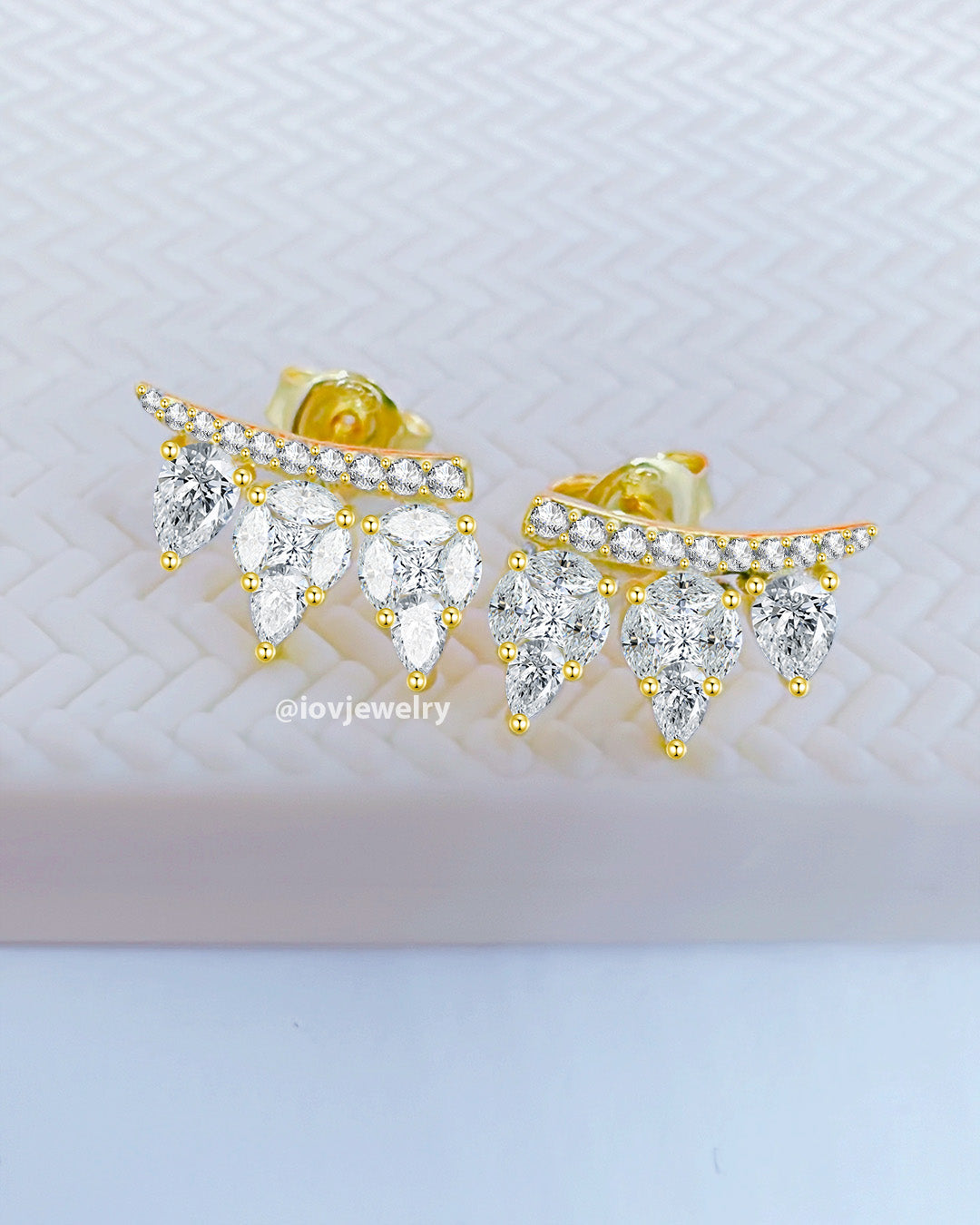 CZ marquise and pear shape stones stud earrings.