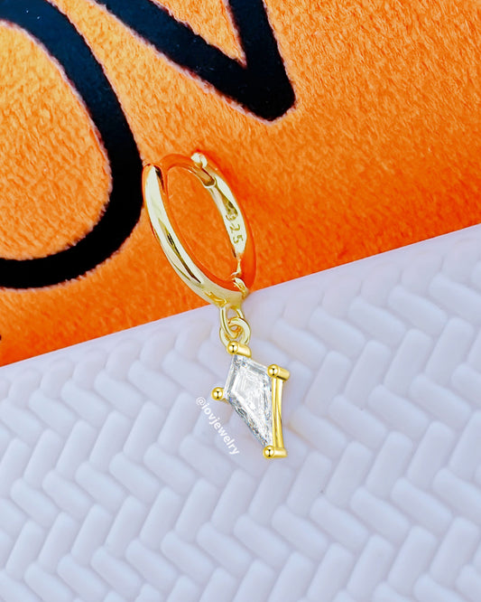 huggie hoop earring with dangling CZ kite shape.