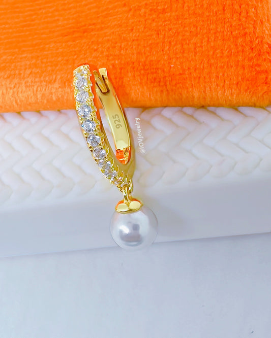 11 mm CZ hoop earring with dangling cultured pearl.