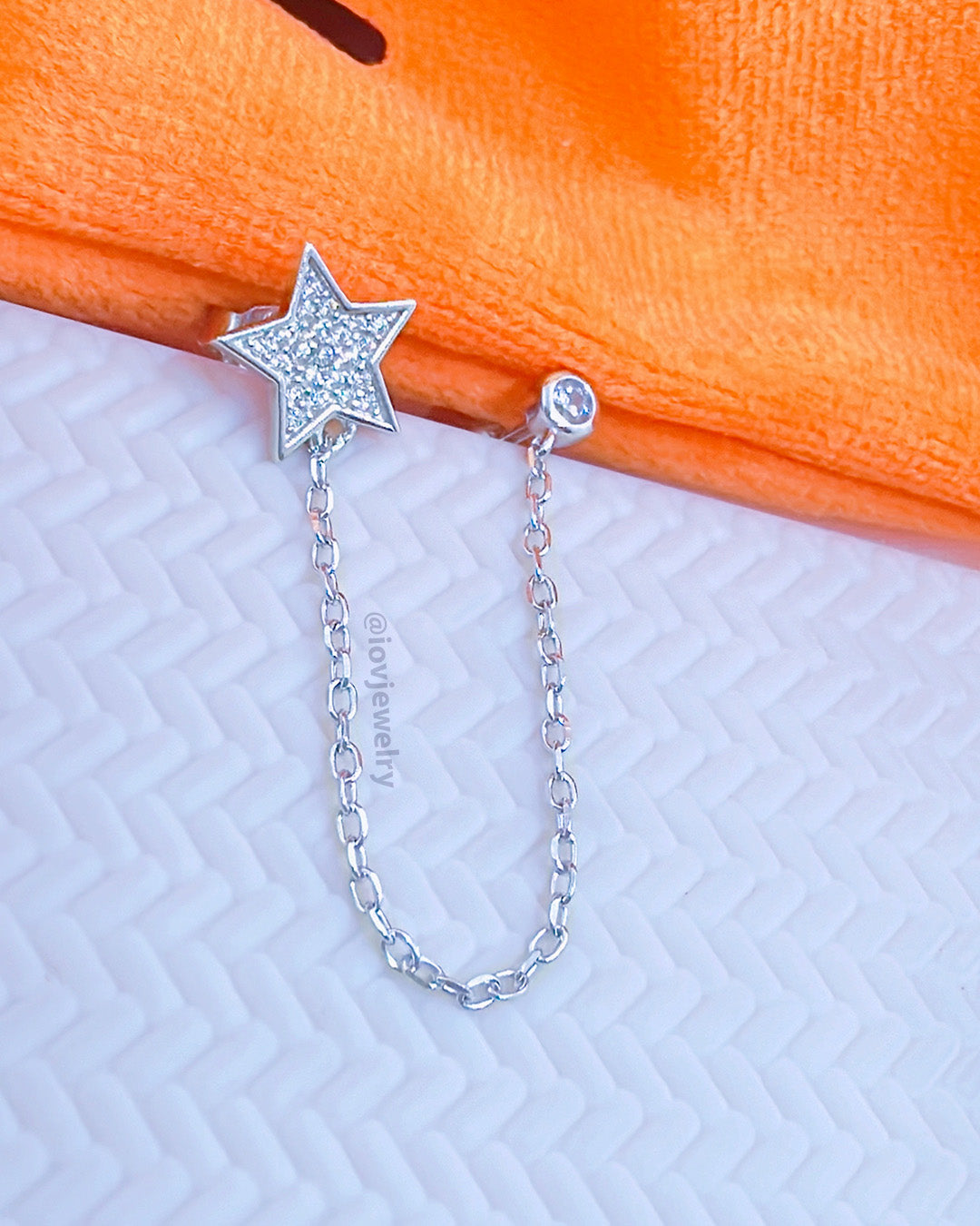 double stud star and CZ bezel stone setting earring.