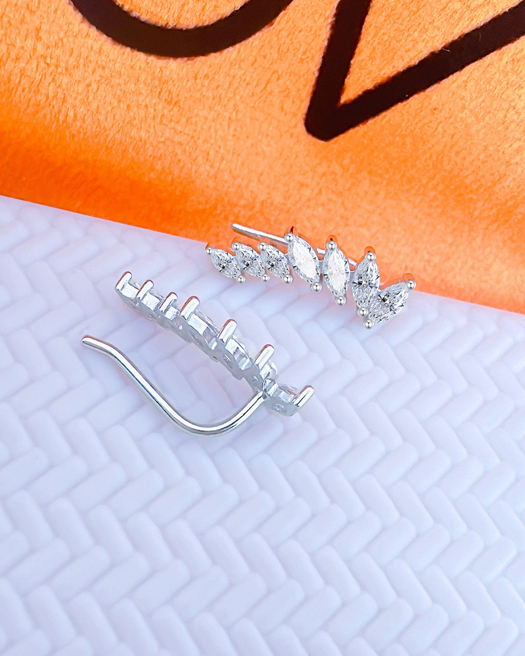 CZ graduated marquise crawler earrings.