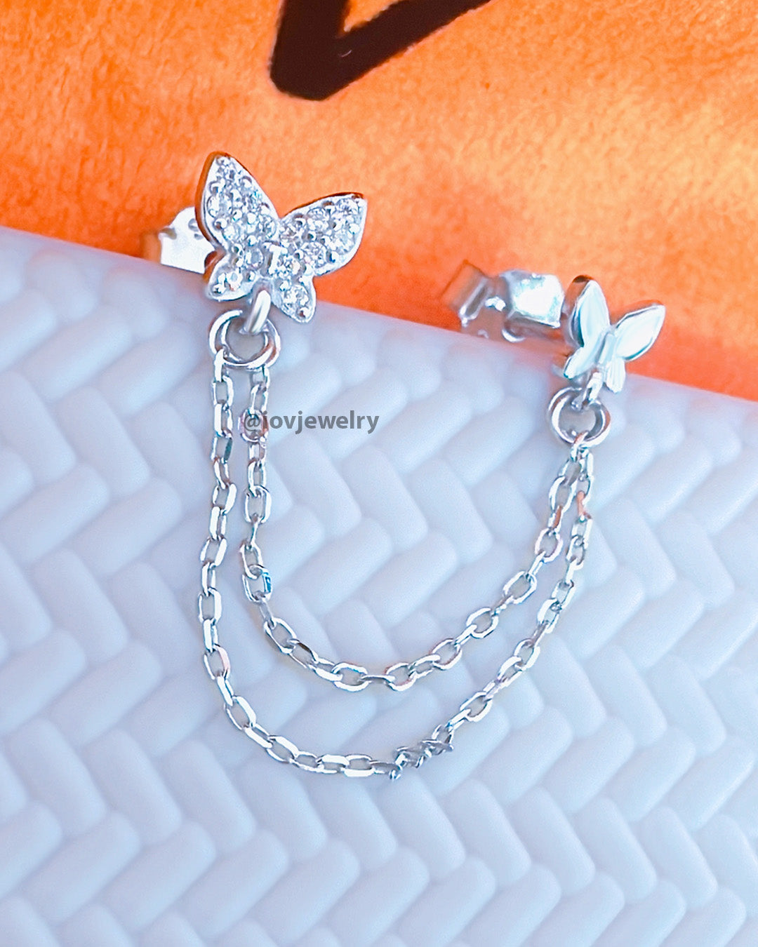 doube stud butterfly chains earring.