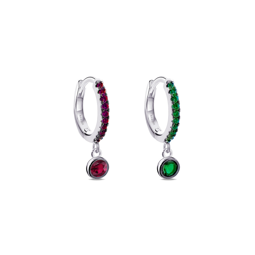 geen and pink hoop earring with dangling round stone in bezel setting.