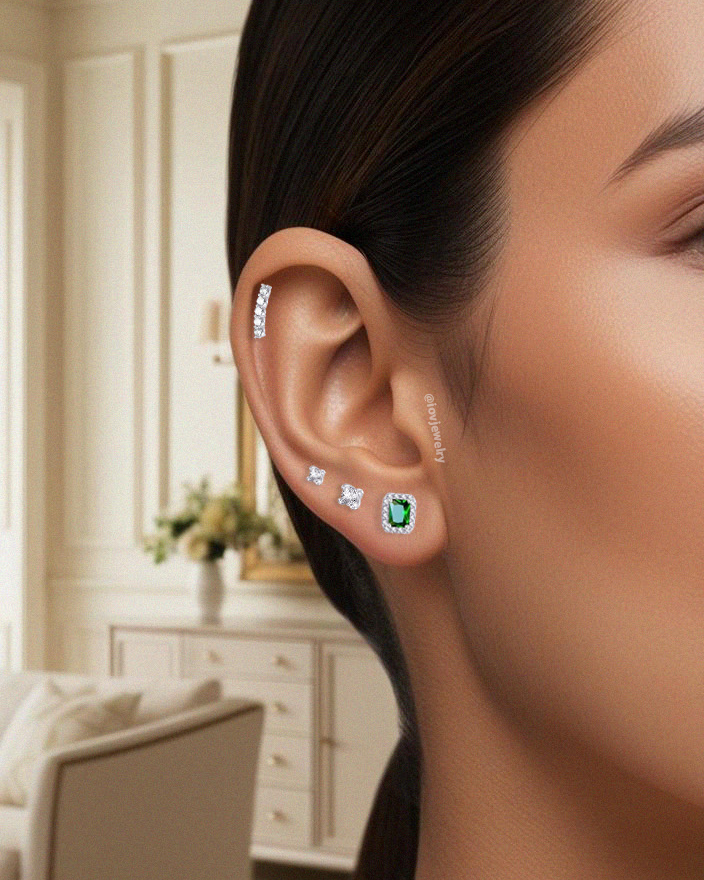 one size round CZ stones in a curved line ballback piercing earring.