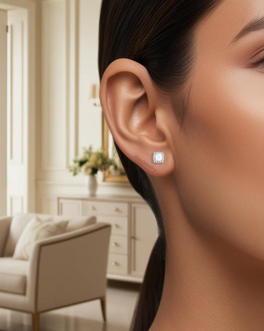 CZ round stone in a square halo setting stud earring.