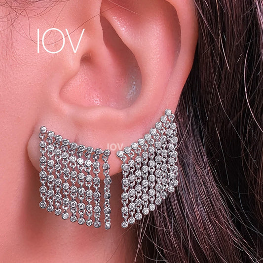 dangling lines of round stones in bezel setting stud earring.