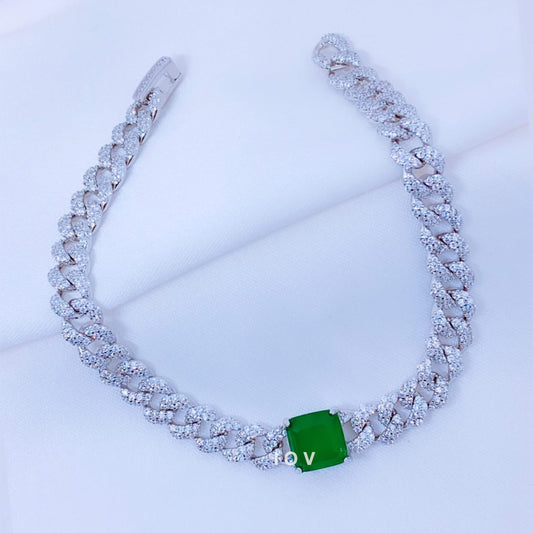 curb chain diamond style bracelet with square emerald stone.