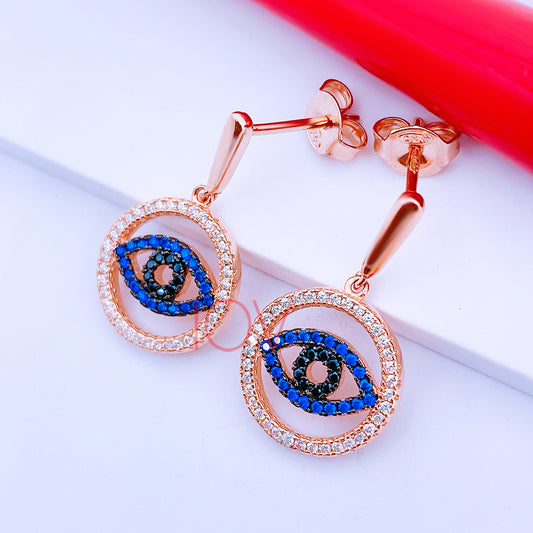Rosegold blue eye earrings.