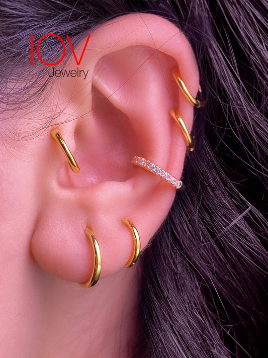 Plain golden hoops.