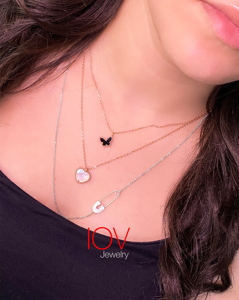 mother of pearl and agate butterfly rosegold necklace.