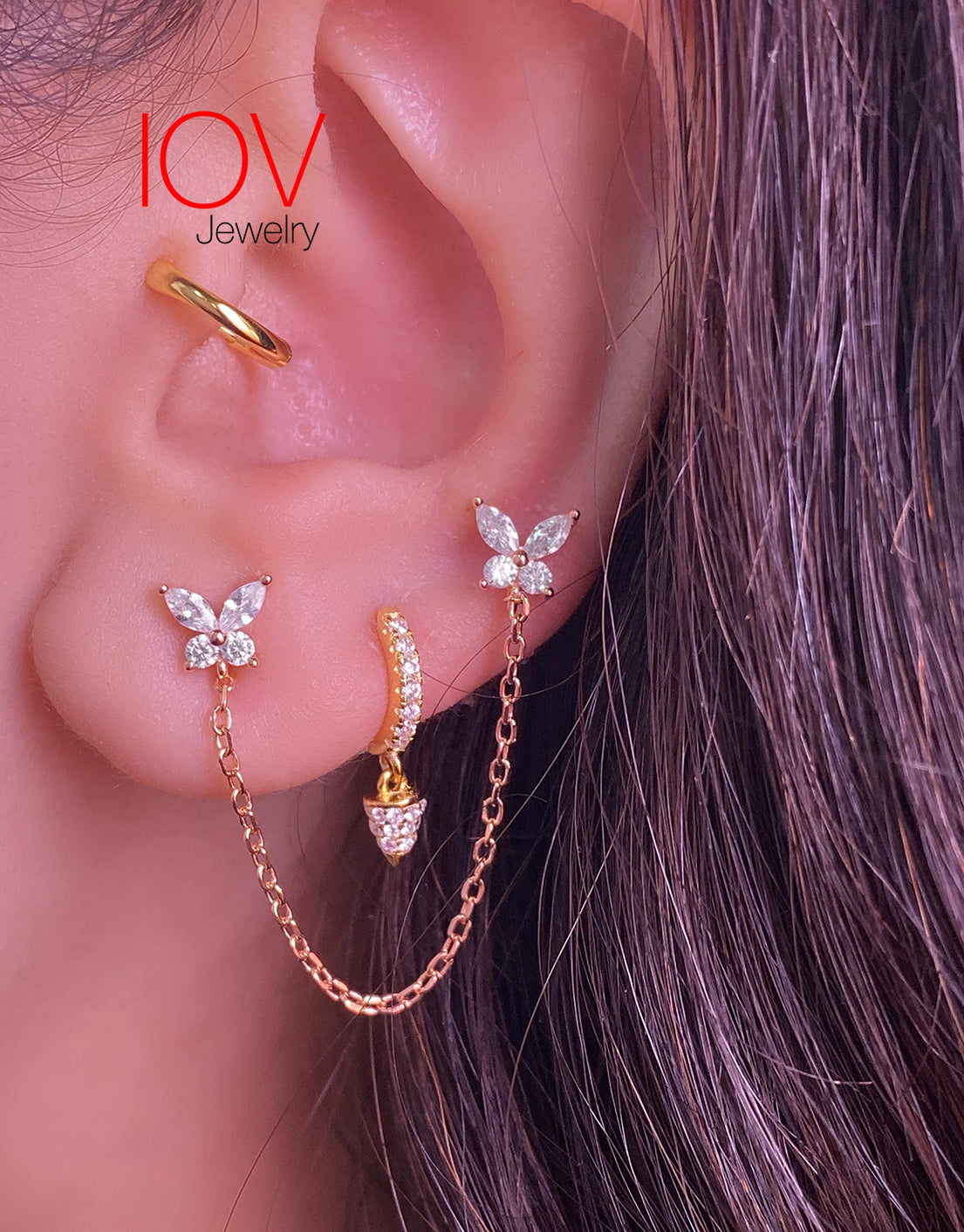 butterfly double stud earring.