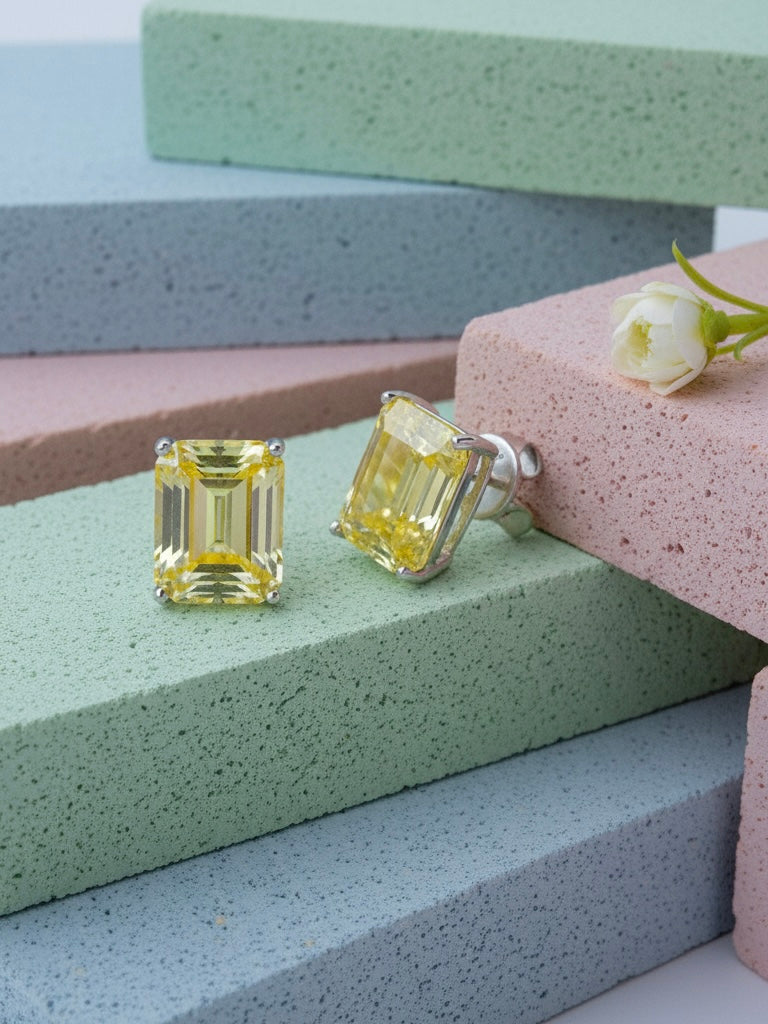 rectangular pink and yellow CZ stud earrings.