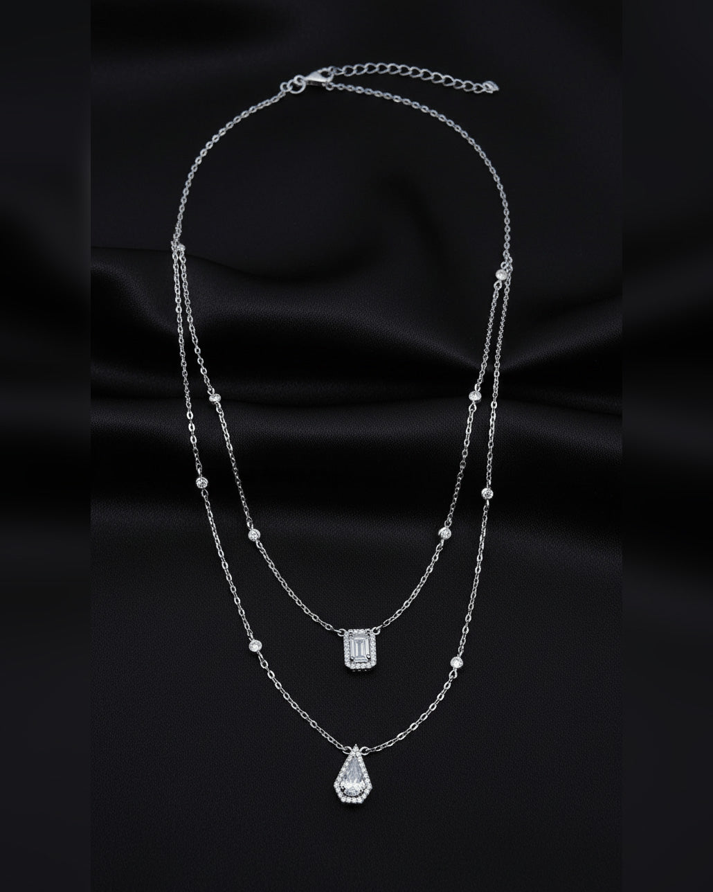 two layers necklace of rectangular and kite CZ shape.