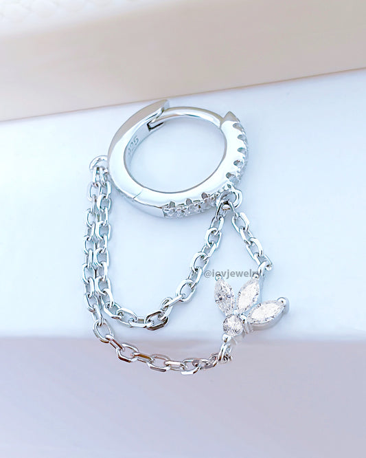 CZ huggie hoop with dangling double chains adorned with louts shape marquise stones.