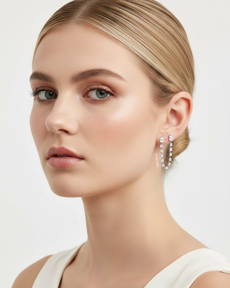 double stud Pear and round connected CZ earring.
