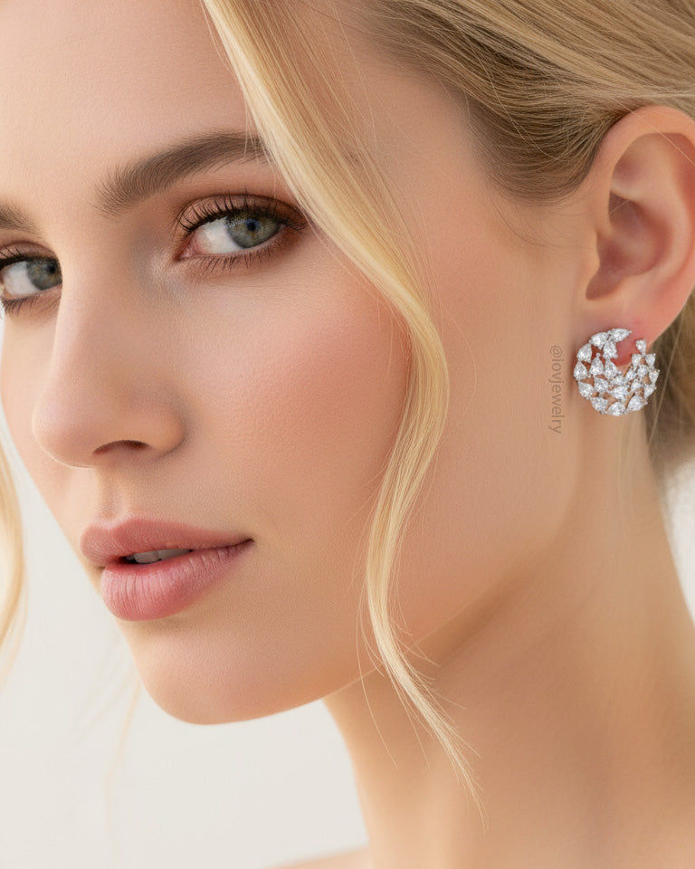 circle of graduated CZ pear shapes stud earring.