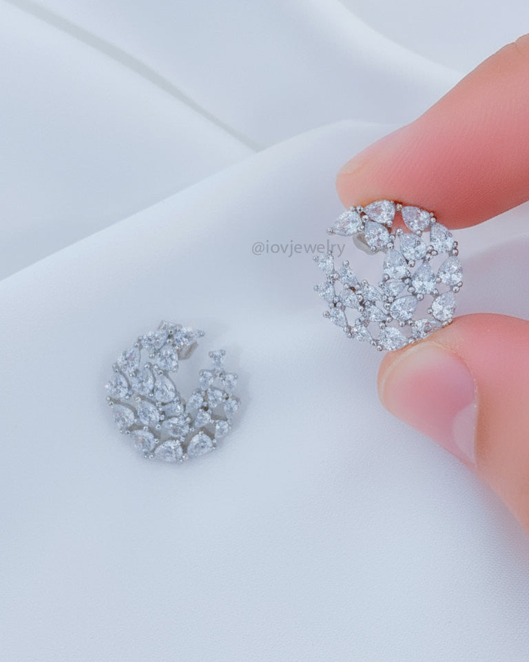 circle of graduated CZ pear shapes stud earring.