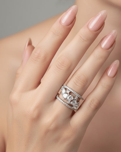 cage style ring of pear and round CZ.
