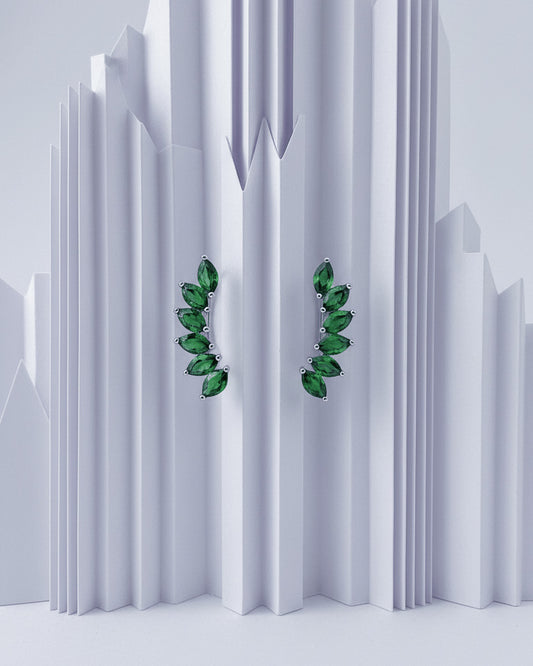 Climber style emerald and ruby color earrings.