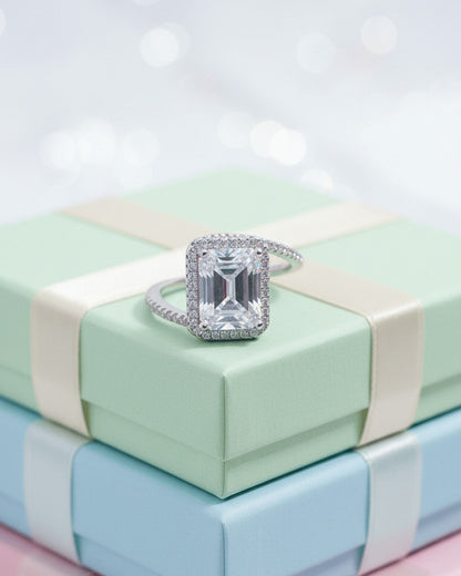 CZ emerald cut in halo setting solitaire ring.
