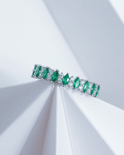 half band of emerald color marquise and round CZ.