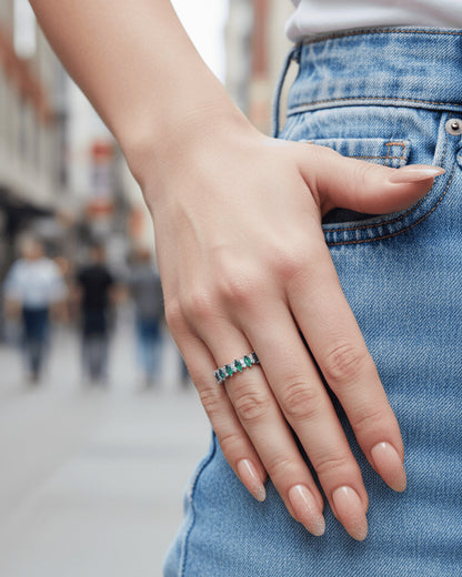 half band of emerald color marquise and round CZ.