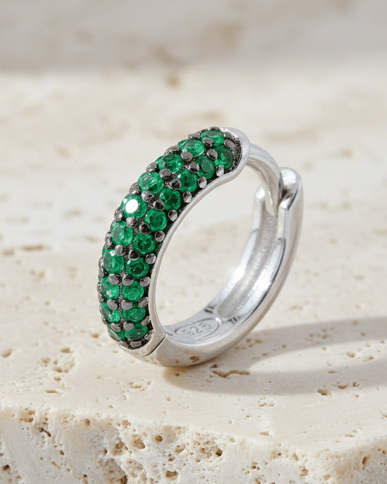 huggie emerald and sapphire three rows of stones earring.