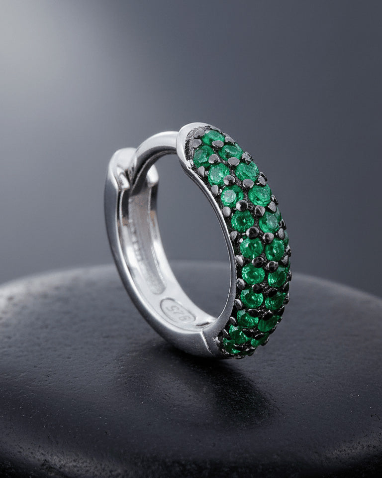 huggie emerald and sapphire three rows of stones earring.