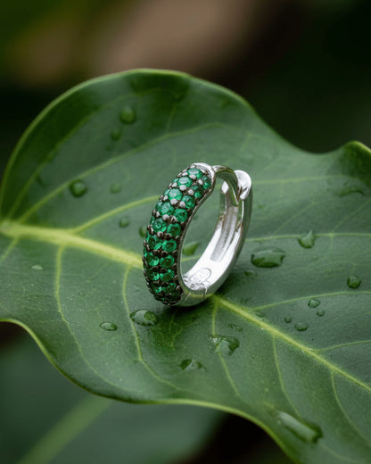 huggie emerald and sapphire three rows of stones earring.