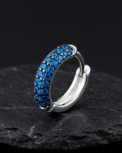 huggie emerald and sapphire three rows of stones earring.