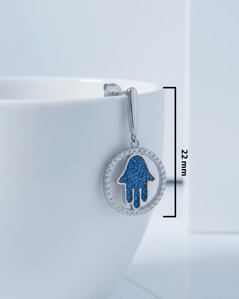 Hamsa sapphire color shape in a circle stud earring.