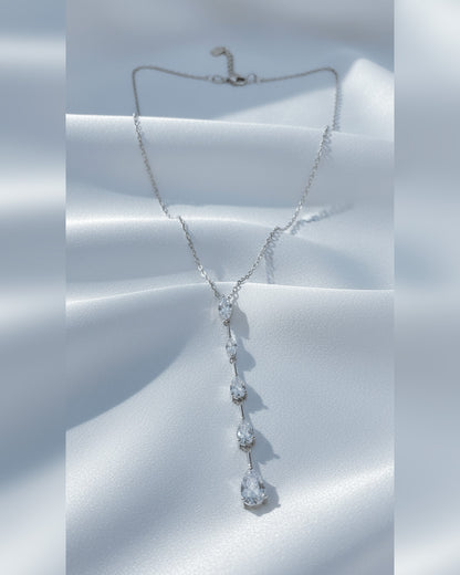 Y model necklace of marquise and pear shape CZ.