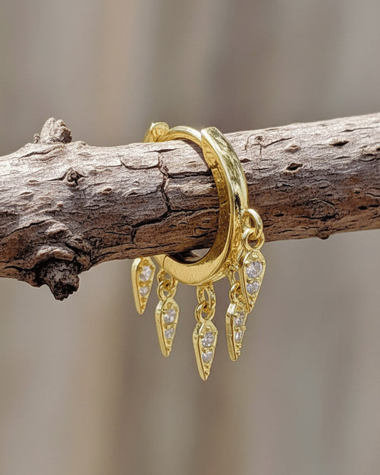 plain huggie hoop with dangling kite shapes with CZ.