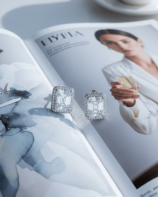 rectangular CZ emerald cut in halo setting stud earring.