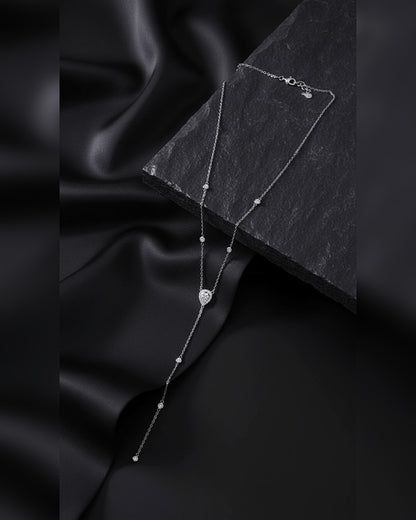 Y model shape of center pear shape in halo setting CZ stone.