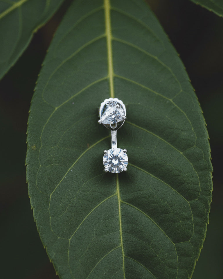 Pear and round shape CZ back to front stud earring.