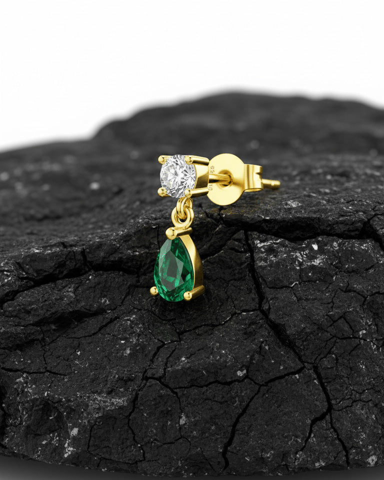 round stone stud earring with dangling emerald color pear shape stone.