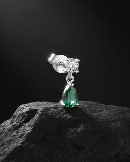 round stone stud earring with dangling emerald color pear shape stone.