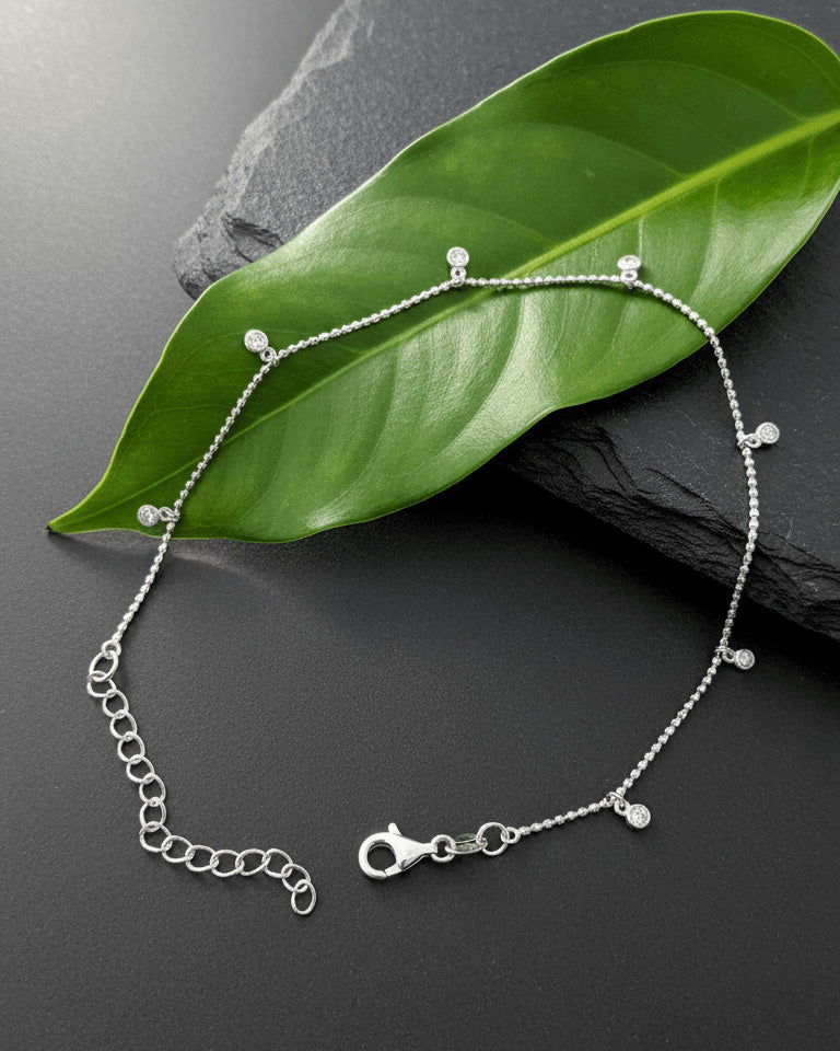 faceted beads anklet with dangling round CZ in bezel setting.