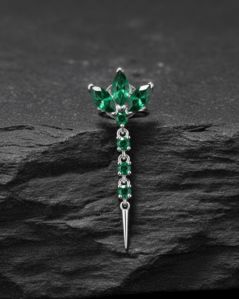 lotus shape stud earring with dangling line of emerald color stones.