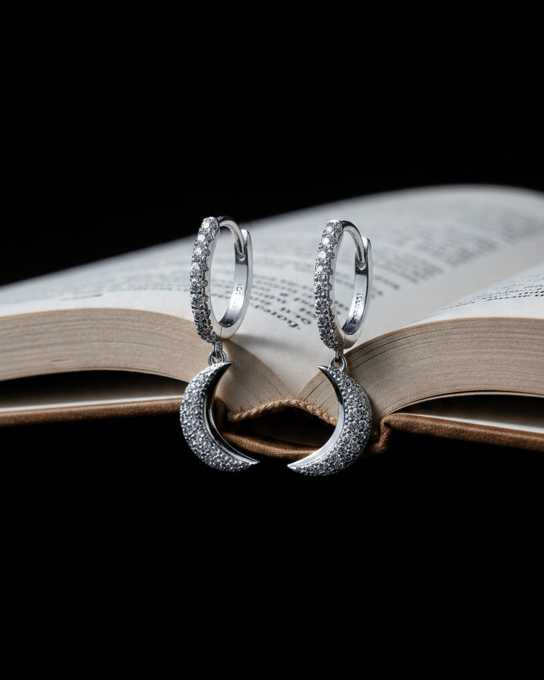 CZ hoops earrings with dangling crescent shape.