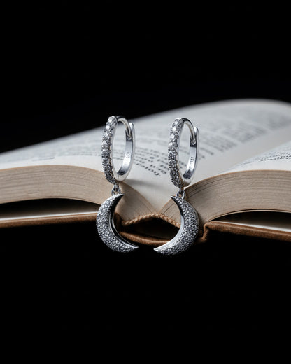 CZ hoops earrings with dangling crescent shape.