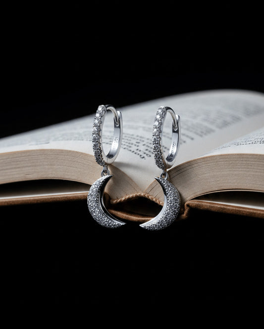 CZ hoops earrings with dangling crescent shape.