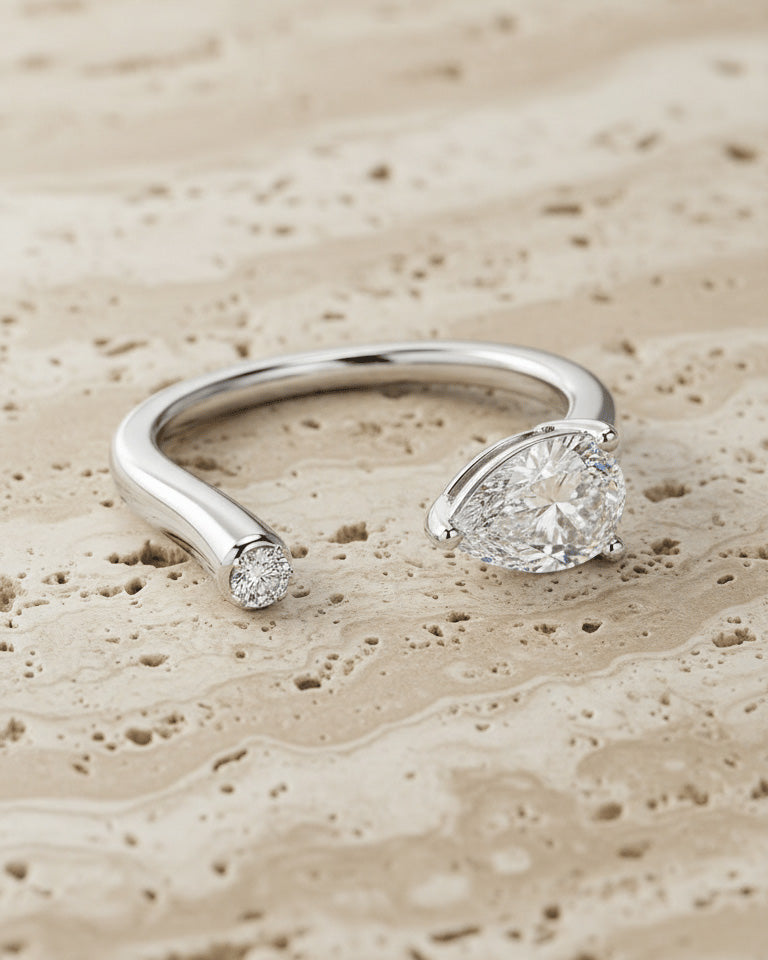 Pear and round CZ fashion open ring.