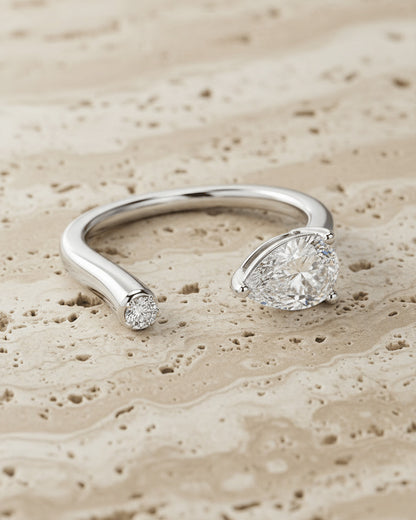 Pear and round CZ fashion open ring.